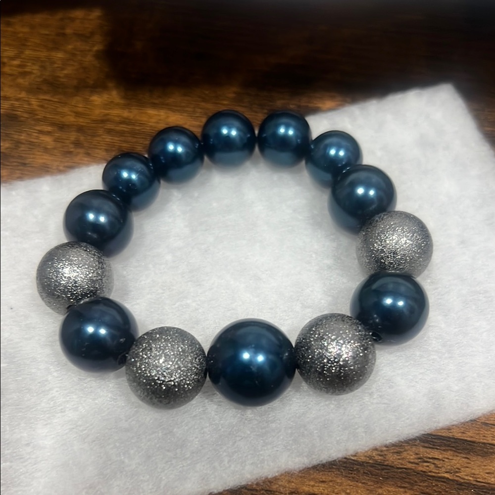 Silver and Blue Beaded Bracelet with Textured Accents